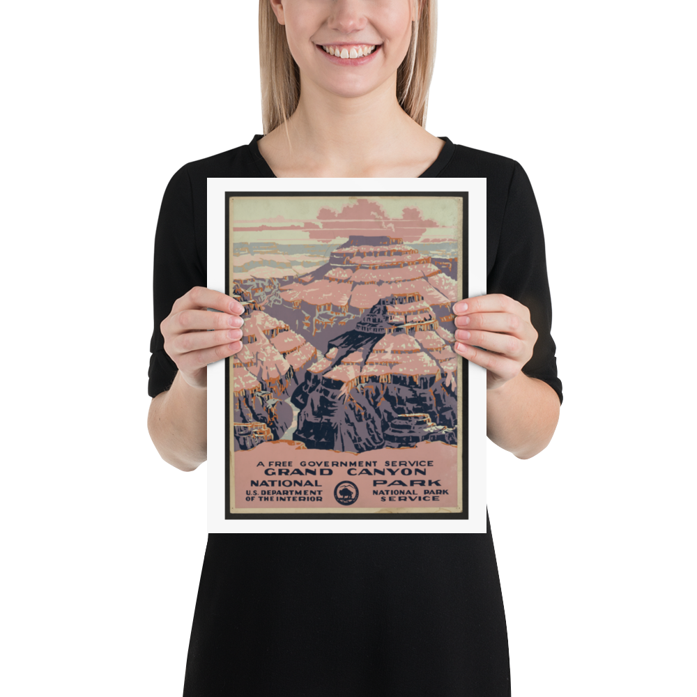 Person holding a framed Grand Canyon National Park poster