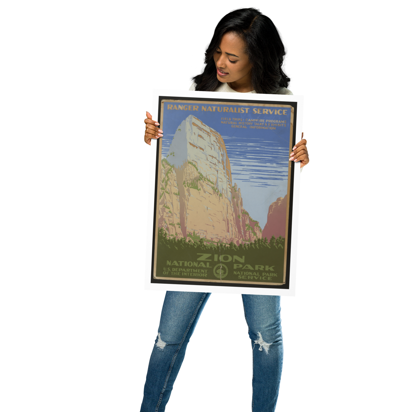 Woman holding a Zion National Park poster against a white background